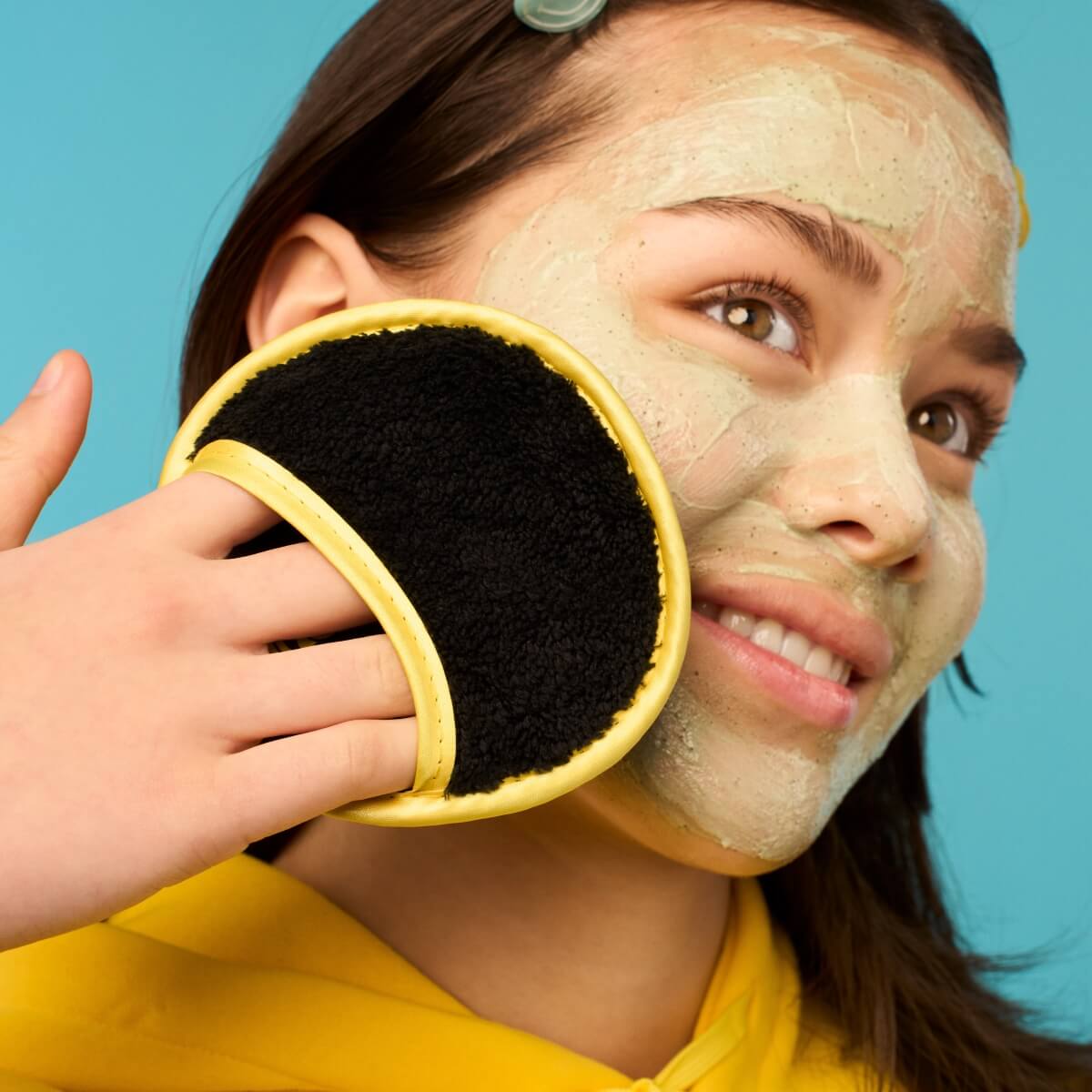 Teenager using Kinside Earth Exfoliating Mask