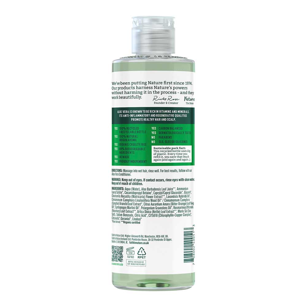 Bottle of faith in nature soothing shampoo with green label on a white background