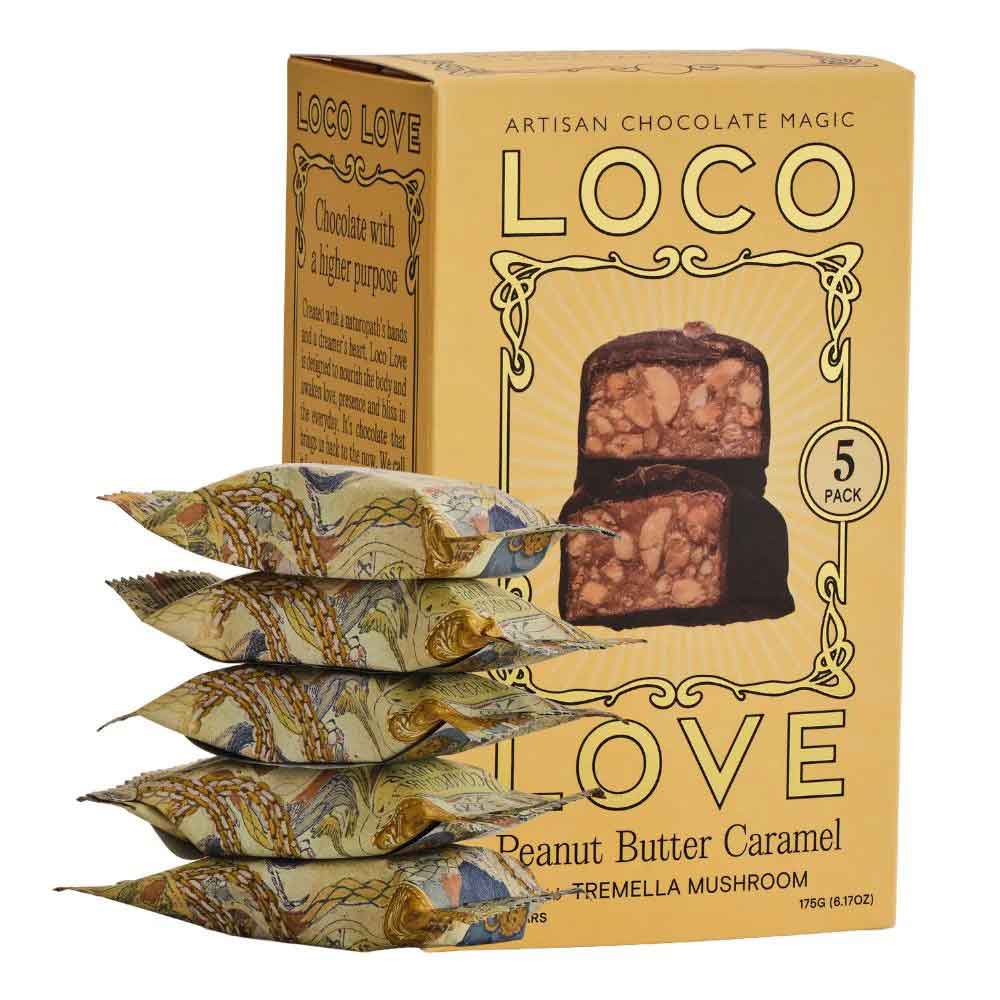 Packaging of Loco Love artisan chocolate with product packaging and stacked chocolate pieces.