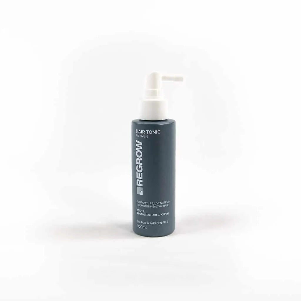 Hair tonic bottle labeled 'Regrow' on a white background