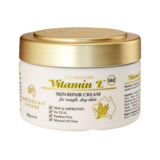 A jar of Australian Creams MkII Vitamin E Skin Repair Cream, 250g, with labels indicating it is suitable for face and body, and highlighting natural ingredients such as sunflower oil and sweet almond oil.