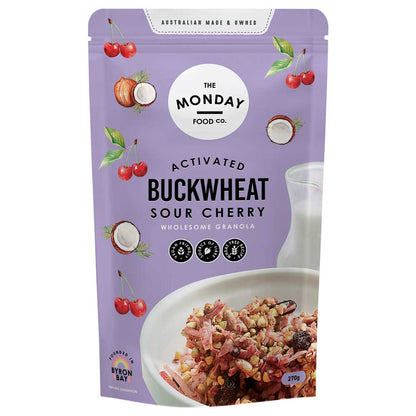 Purple package of The Monday Food Co. Activated Buckwheat Sour Cherry granola with images of ingredients on a white background.