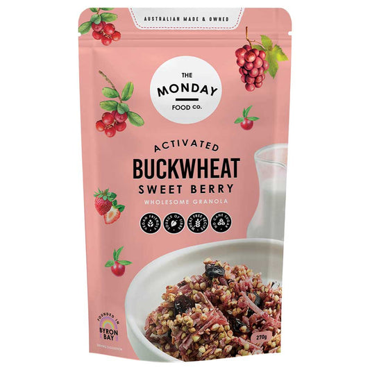 Pink package of The Monday Food Co. Activated Buckwheat Sweet Berry granola with a bowl of granola on a white background.