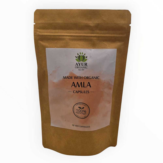 Brown package of Ayur Organic Amla capsules on a white background