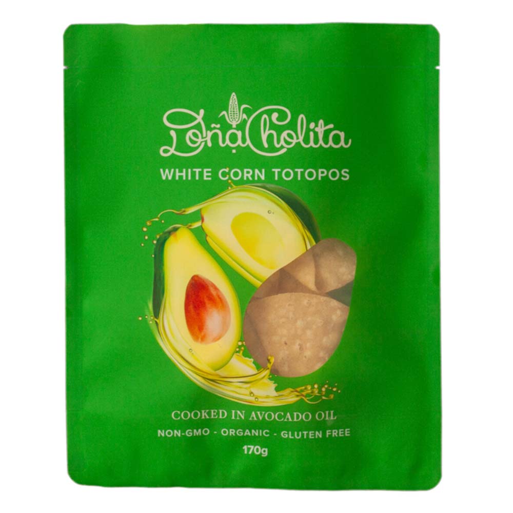 Green package of Dona Cholita white corn totopos with avocado illustration on a white background
