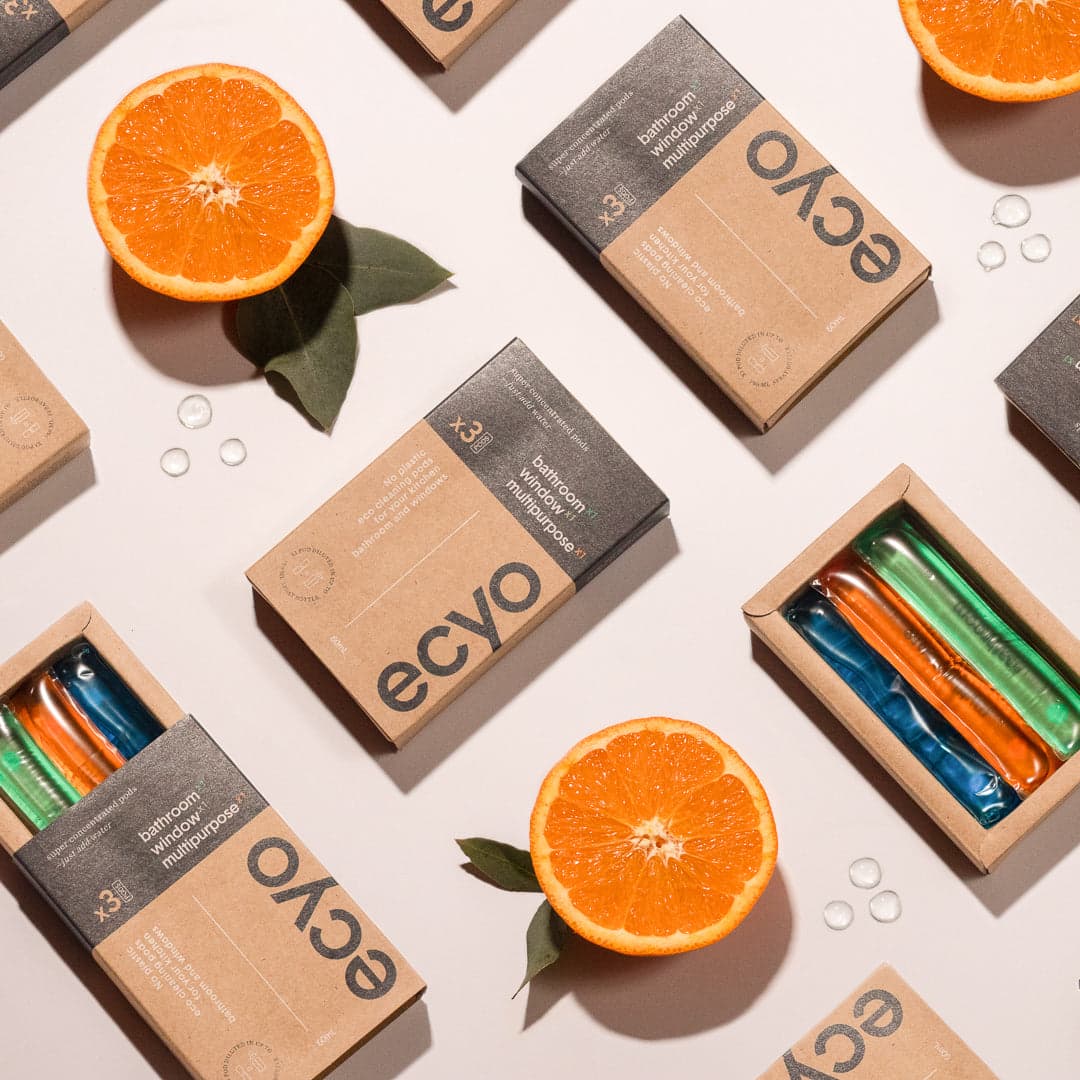 ecyo product boxes with oranges on a light background
