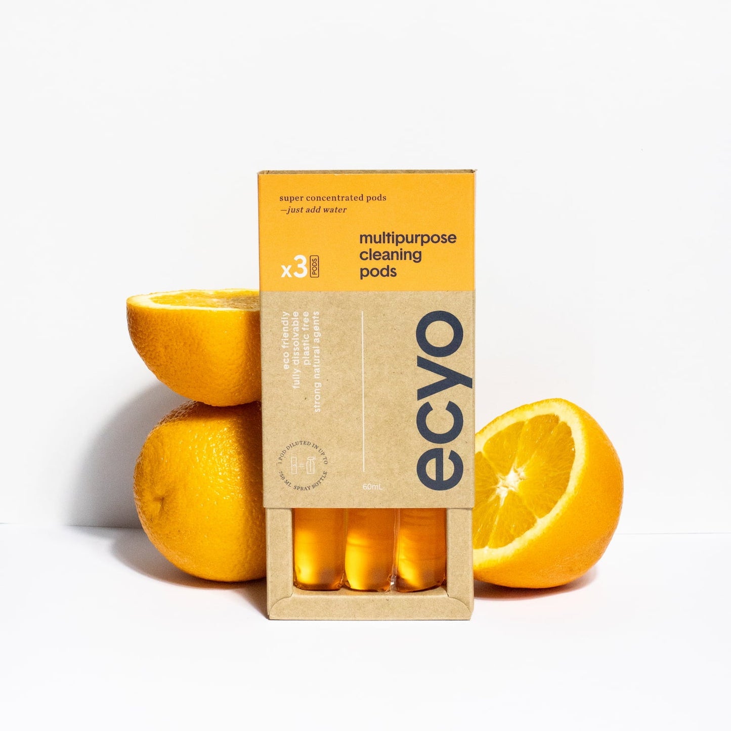 Box of ecyo multipurpose cleaning pods with oranges on a white background