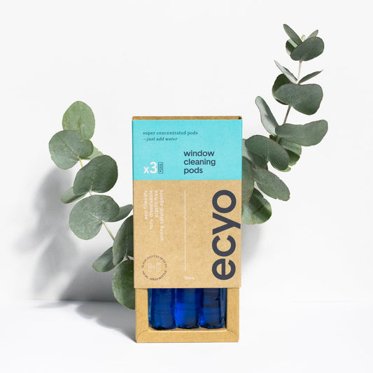 Pack of ecyo eco-friendly window cleaning pods with eucalyptus leaves on a white background