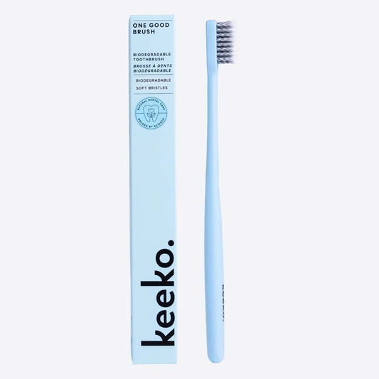 Keeko bio toothbrush and packaging in blue on a white background