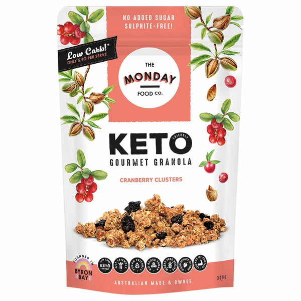 Keto gourmet granola packaging with cranberries and nuts on a white background