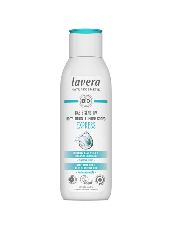 A white bottle of Lavera Basis Sensitiv Body Lotion Express 250ml for normal or sensitive skin, featuring organic aloe vera and jojoba oil on the label and a blue water splash graphic on the front.