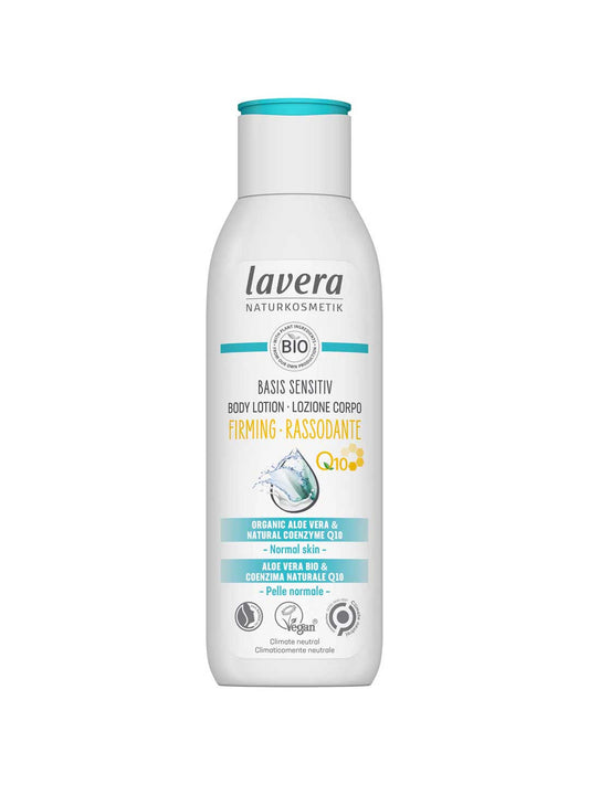 A white bottle of Lavera Basis Sensitiv Body Lotion Firming Q10 250ml for normal skin, with a blue cap and labels featuring organic aloe vera, Q10 for firming, and vegan, natural ingredients.