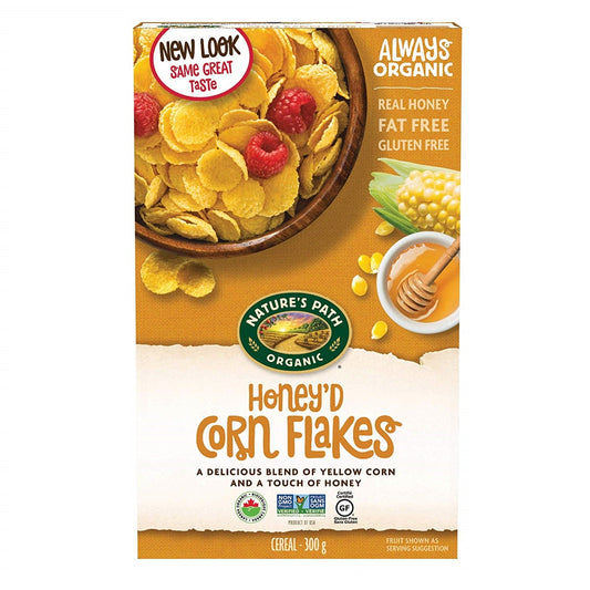 Box of Nature's Path Organic Honey'd Corn Flakes cereal with a bowl of cereal and honey on the label.
