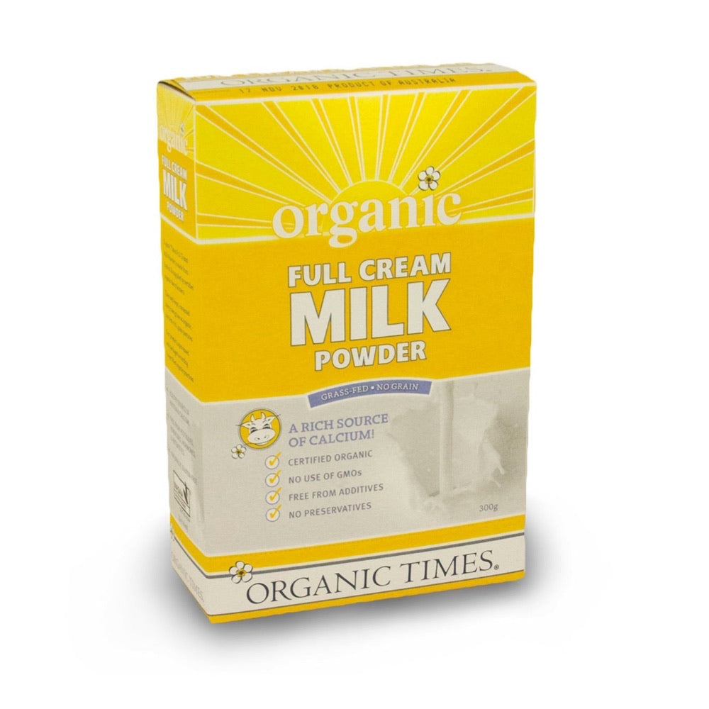 Box of Organic Times full cream milk powder on a white background