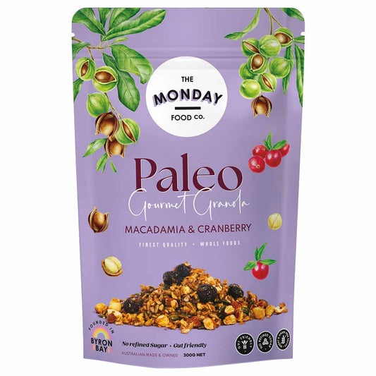 Purple package of Paleo Gourmet Granola with macadamia and cranberry on a white background