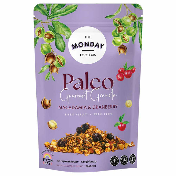 Purple package of Paleo Gourmet Granola with macadamia and cranberry on a white background