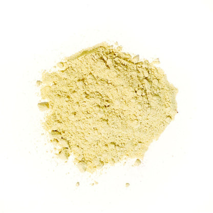 Yellow powder on a white background