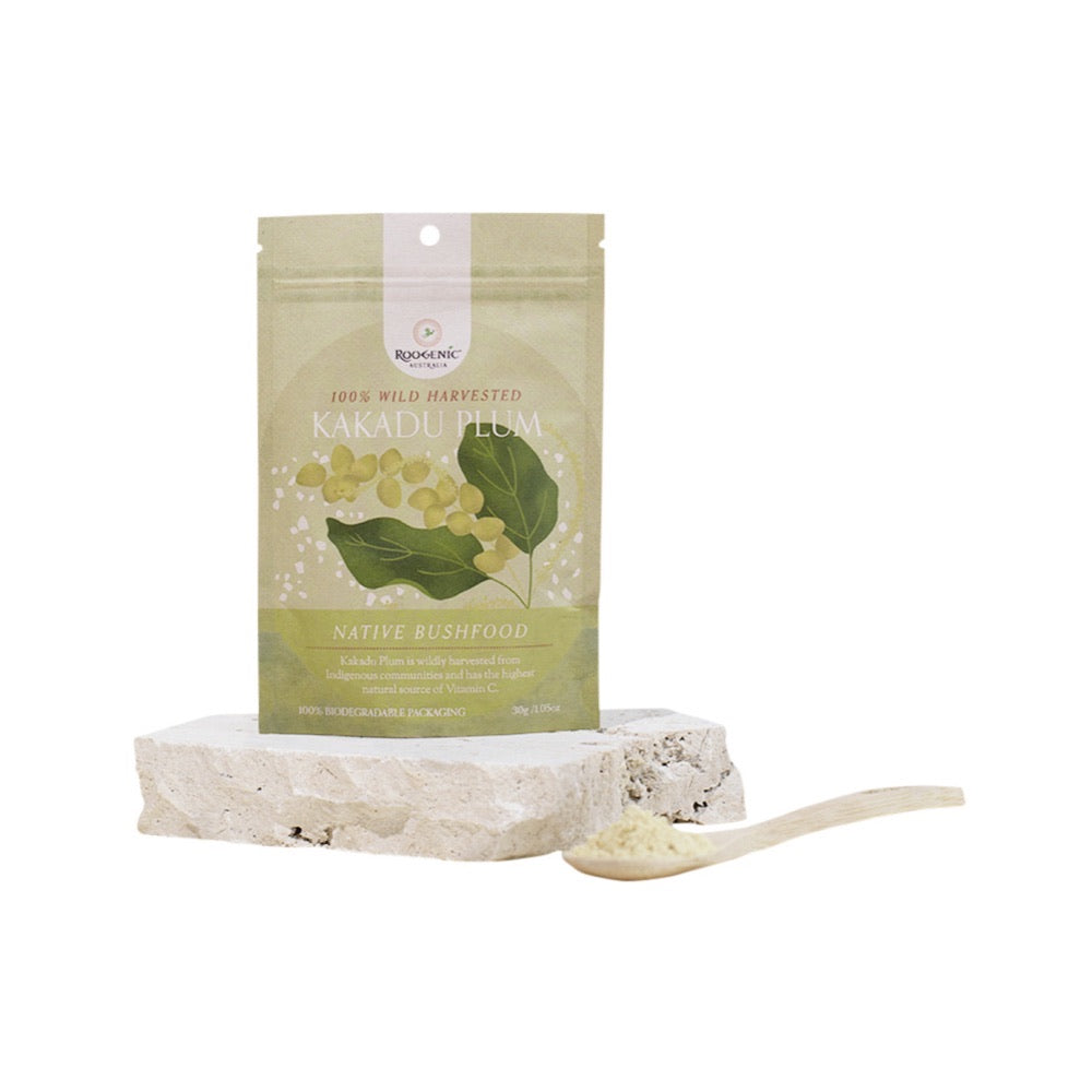 Kakadu plum package with a spoonful of powder on a white background