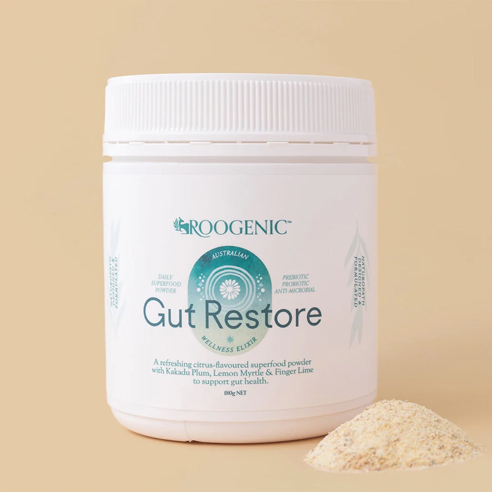 Roogenic Gut Restore powder container on a beige background