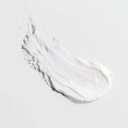 Clear gel or cream swatch on a light gray background