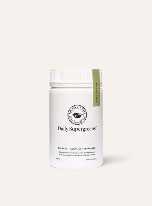 White container of 'Daily Supergreens' on a white background