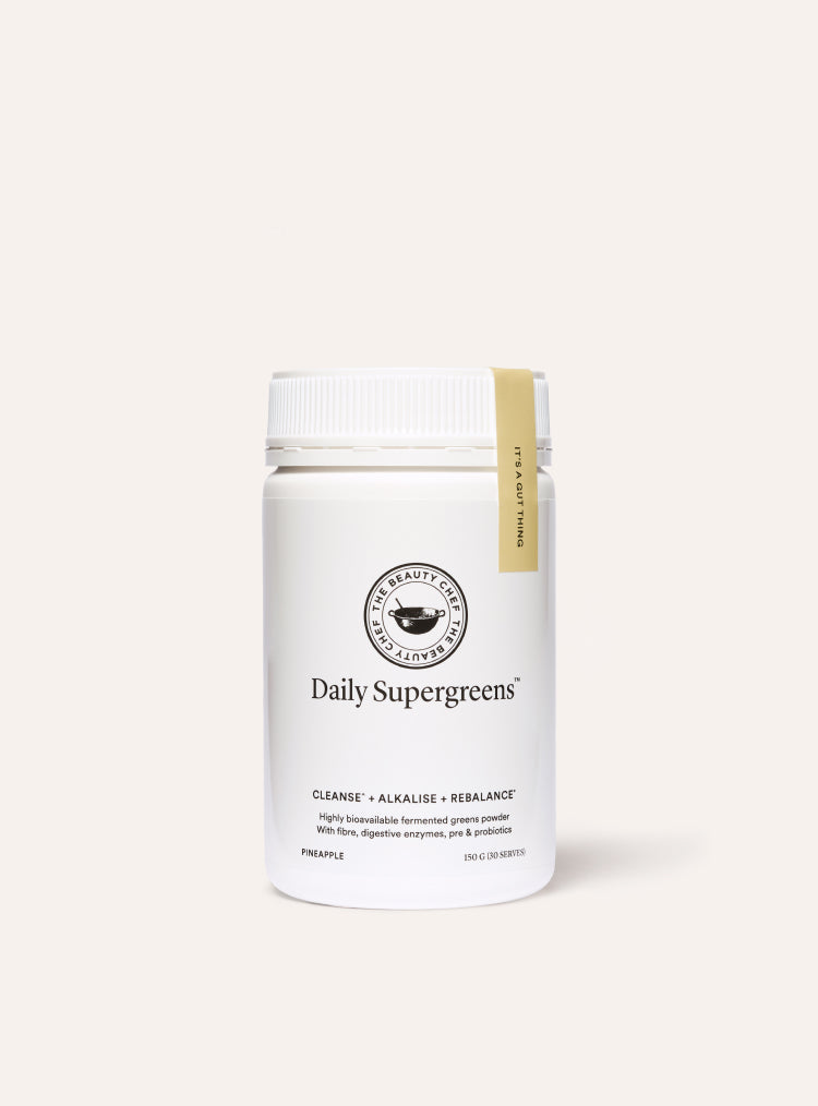 White container of 'Daily Supergreens' on a white background
