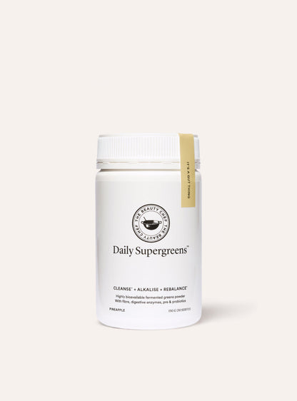 White container of 'Daily Supergreens' on a white background