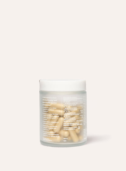 Jar of debloat biotic supplements on a white background