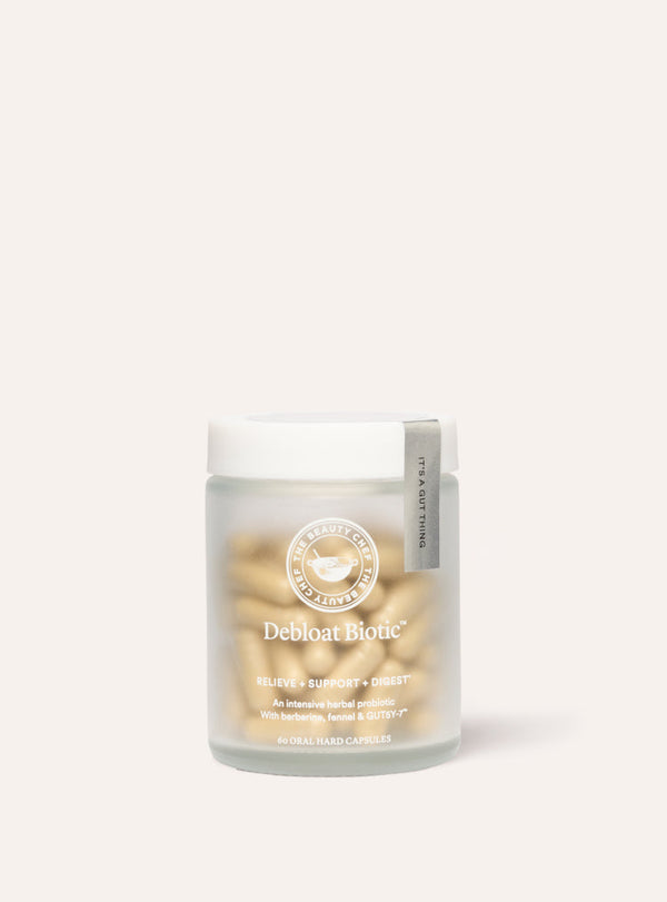 Bottle of Debloat Biotic supplement on a white background