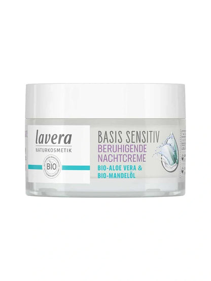 Low clear jar of Lavera Basis Sensitiv Calming Night Cream with a wide white lid, a pale label with turquoise accents and a water-droplet graphic.