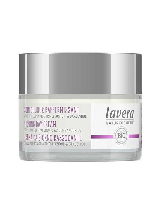 Low clear Lavera Firming Day Cream jar with a wide reflective silver lid, a white label, purple lettering and a horizontal purple stripe.